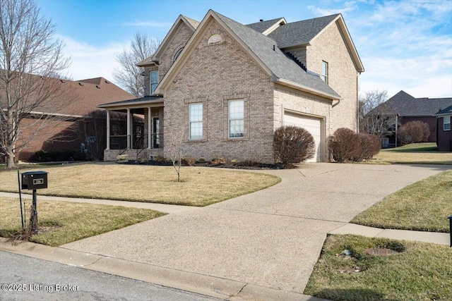 traditional-style house featuring a front yard, brick siding, driveway, and roof with shingles