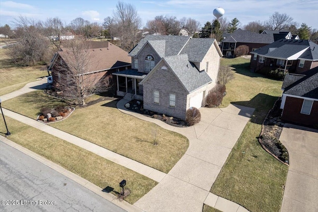 birds eye view of property with a residential view