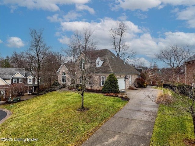 cape cod-style house featuring a garage, driveway, and a front lawn