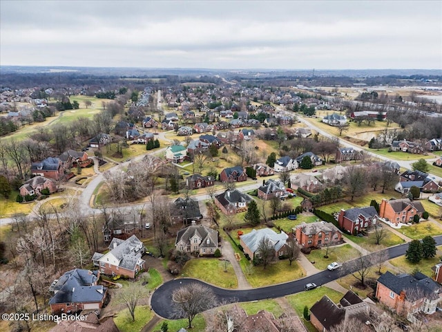 birds eye view of property with a residential view