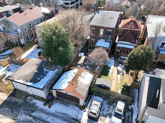 birds eye view of property with a residential view