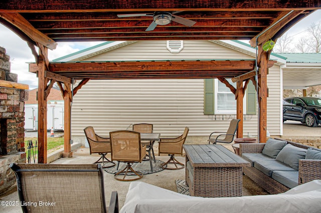 view of patio / terrace featuring an outdoor hangout area, outdoor dining area, and a ceiling fan