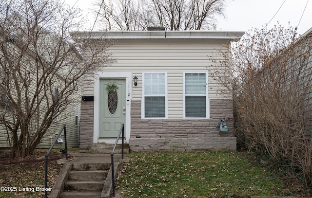 view of front of house featuring stone siding