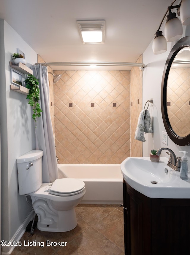 full bathroom featuring vanity, toilet, shower / bath combo with shower curtain, and tile patterned flooring