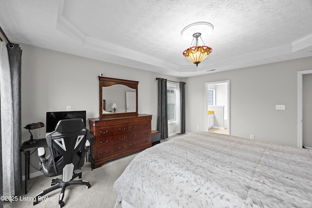 bedroom featuring a textured ceiling, carpet flooring, a raised ceiling, and visible vents