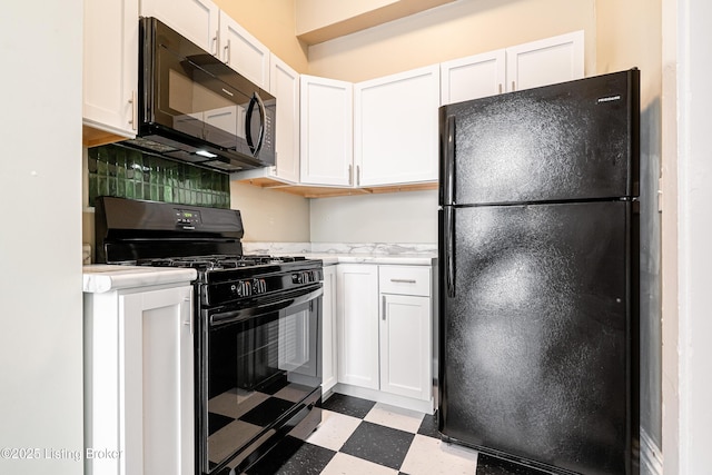 kitchen with black appliances, light countertops, white cabinetry, and tile patterned floors