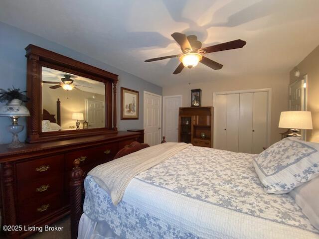 bedroom featuring a closet and a ceiling fan