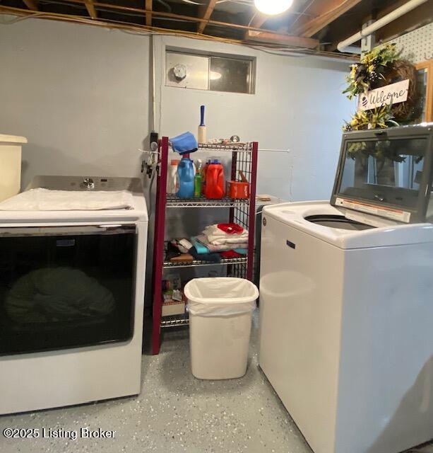 laundry room featuring laundry area and washing machine and clothes dryer