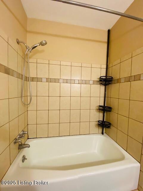 full bath featuring shower / bathtub combination