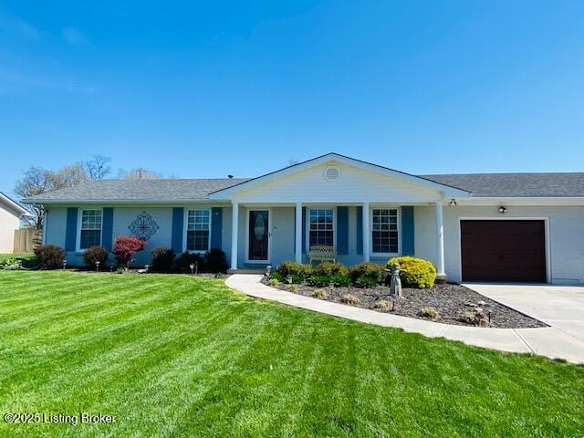 single story home featuring an attached garage, driveway, and a front yard