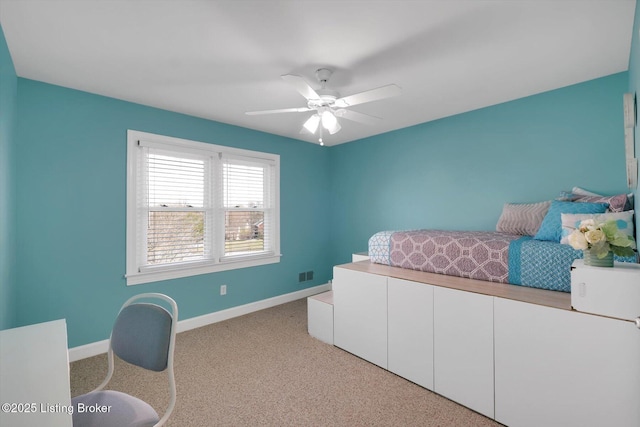 bedroom with carpet floors, baseboards, and visible vents