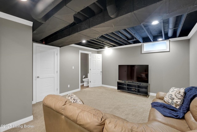 living room with carpet floors and baseboards