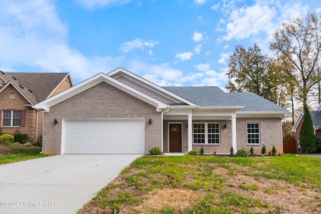 ranch-style home featuring a garage, driveway, roof with shingles, and brick siding