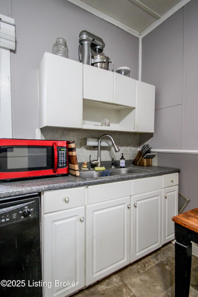 kitchen featuring a sink, backsplash, black dishwasher, dark countertops, and white cabinets