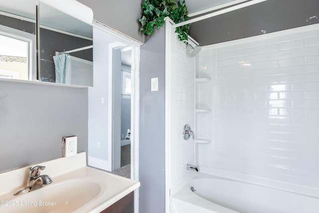 full bath featuring shower / bath combo and vanity