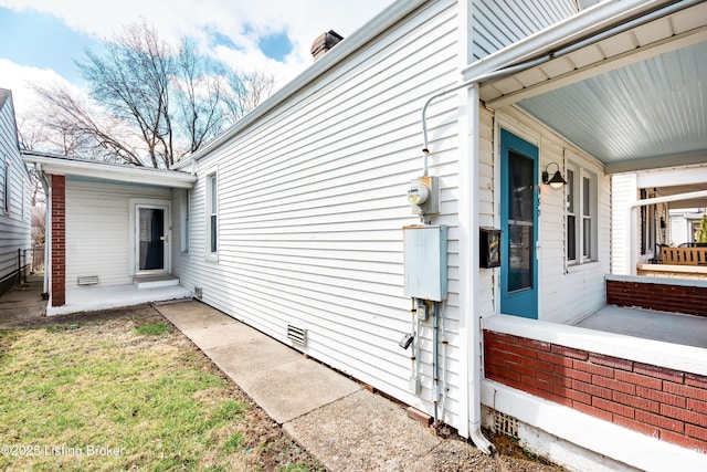 view of home's exterior with crawl space