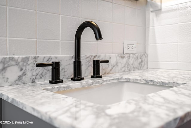 interior details with backsplash and vanity