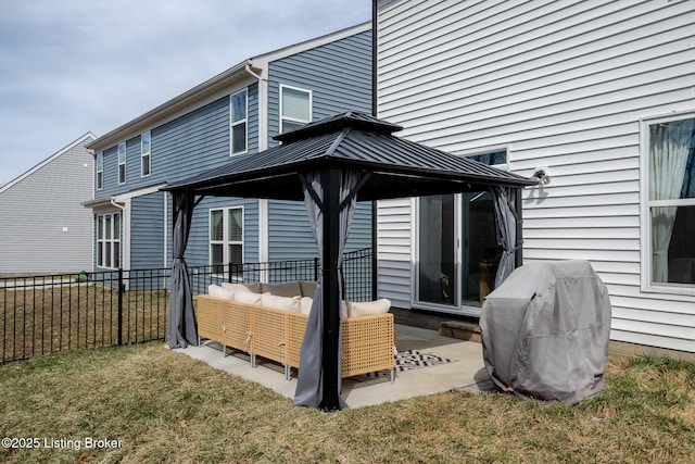 back of house with a patio area, fence, a lawn, and a gazebo