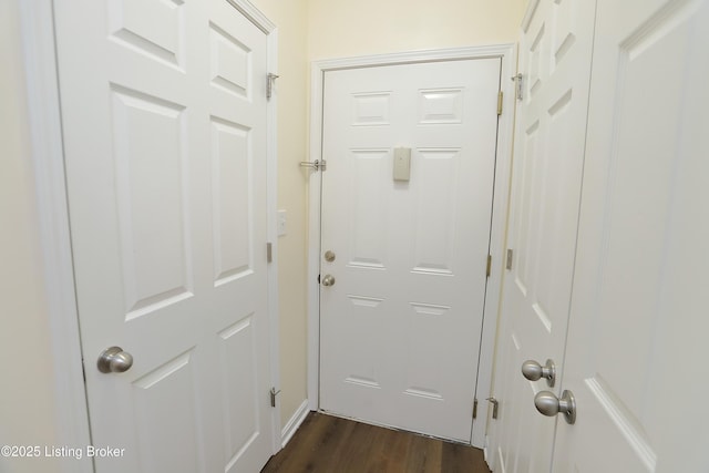 doorway featuring dark wood-style floors