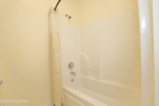 full bathroom with shower / bath combination with curtain