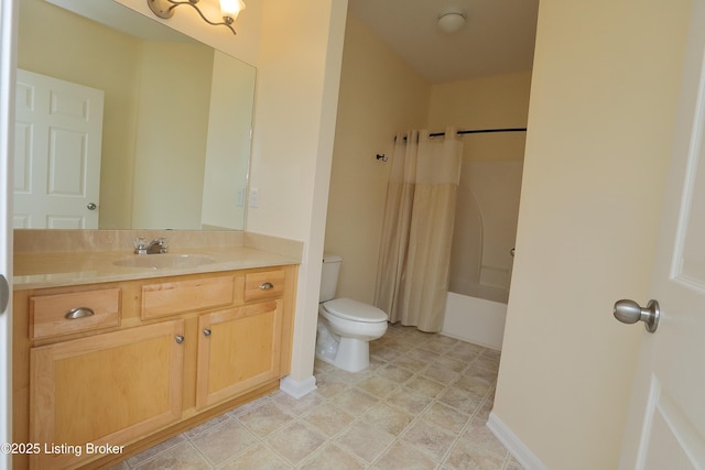 bathroom featuring shower / tub combo, vanity, and toilet