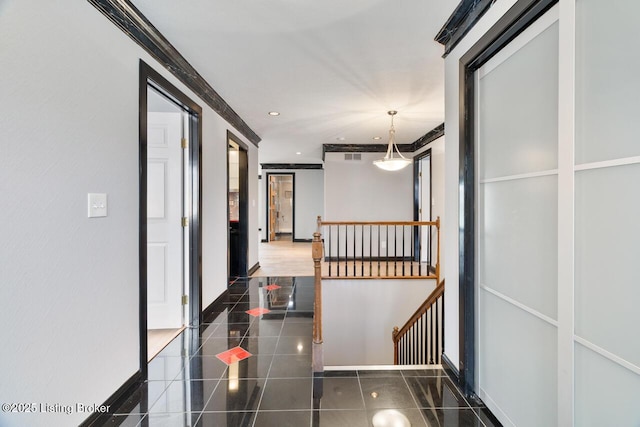 hall featuring baseboards, ornamental molding, tile patterned flooring, an upstairs landing, and recessed lighting