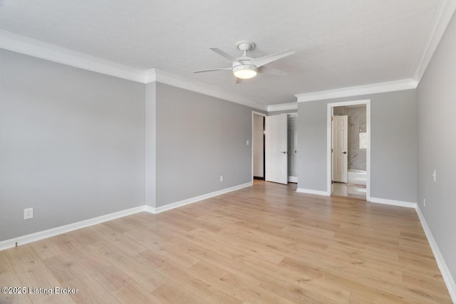 unfurnished bedroom featuring ornamental molding, light wood finished floors, and baseboards