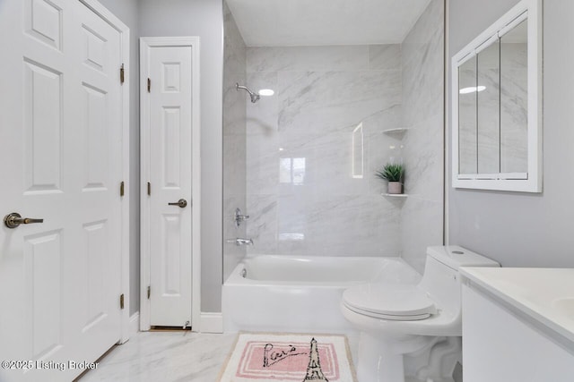 bathroom featuring shower / bath combination, marble finish floor, toilet, and vanity