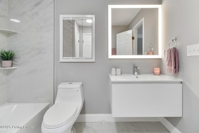 full bath with toilet, vanity, baseboards, marble finish floor, and a bath