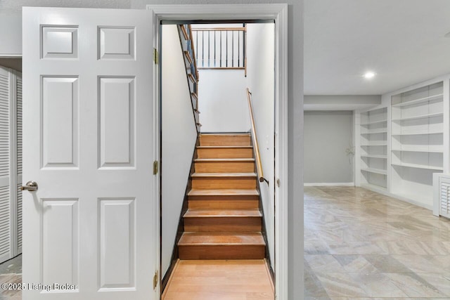 stairway featuring recessed lighting and baseboards