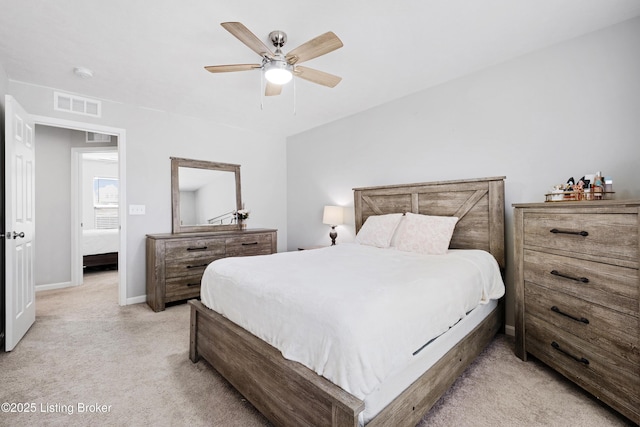 bedroom featuring light carpet, baseboards, visible vents, and ceiling fan