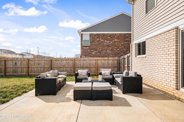 view of patio with a fenced backyard and an outdoor hangout area