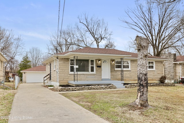 view of front of property featuring covered porch, fence, stone siding, roof with shingles, and a front lawn