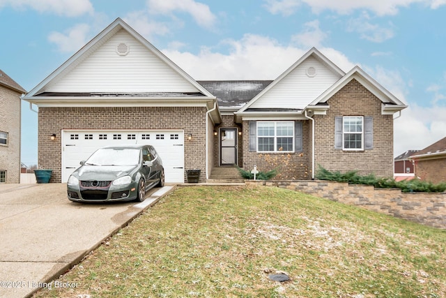 view of front facade with an attached garage, a front yard, concrete driveway, and brick siding