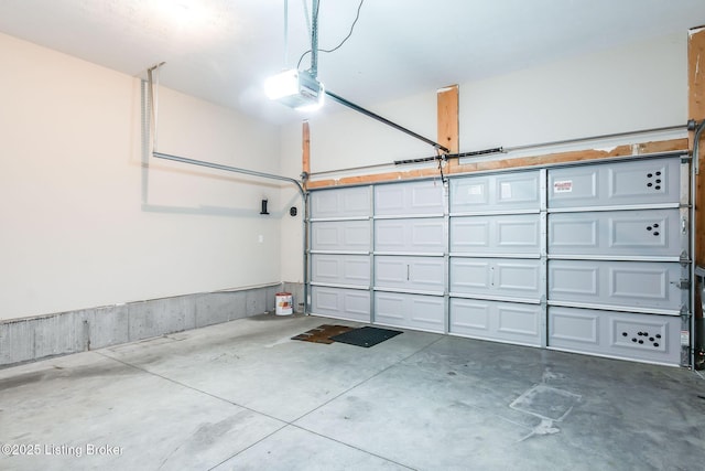 garage featuring a garage door opener