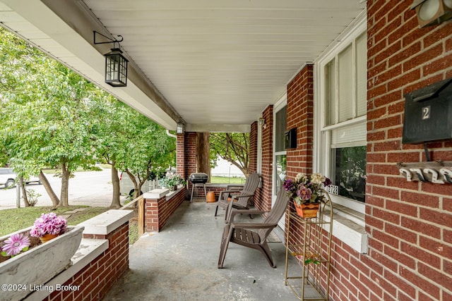 view of patio / terrace featuring a porch and area for grilling