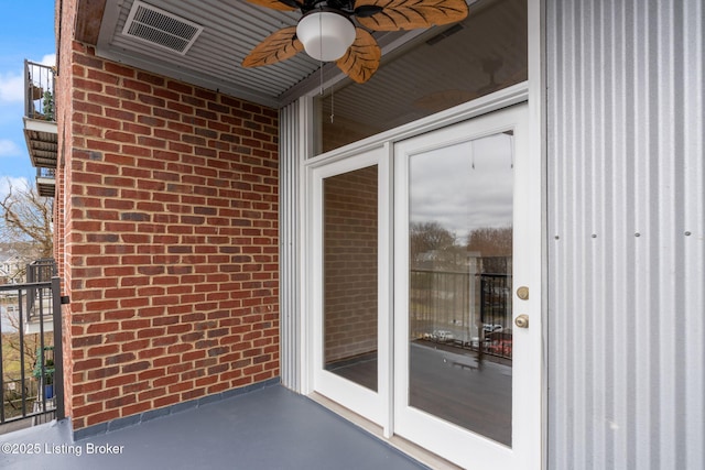 exterior space featuring visible vents and ceiling fan