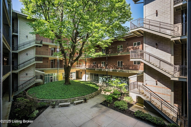 view of community featuring stairway