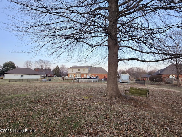 view of yard featuring fence