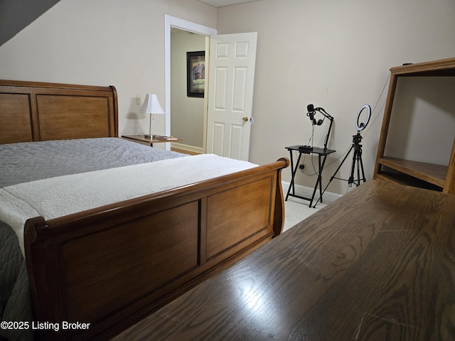 bedroom featuring baseboards