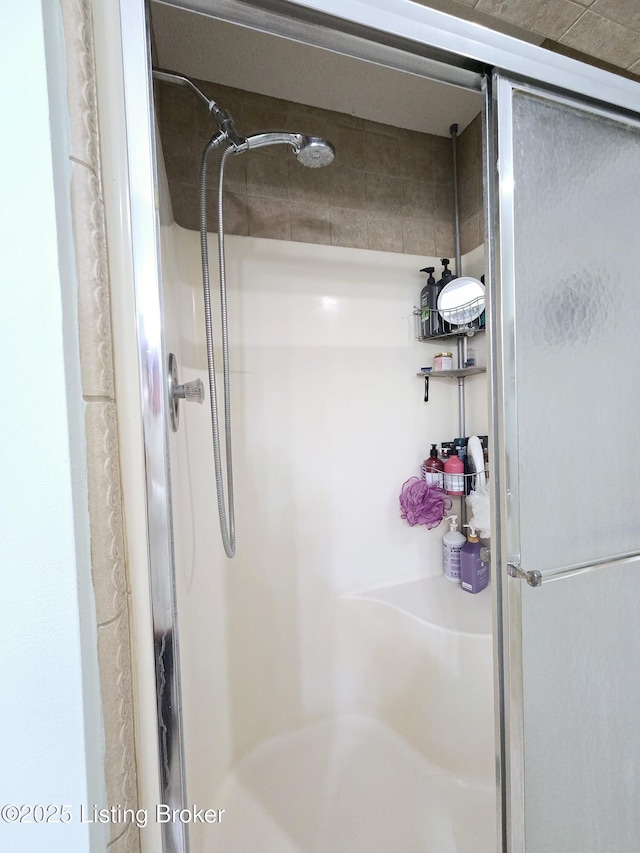 bathroom with a stall shower