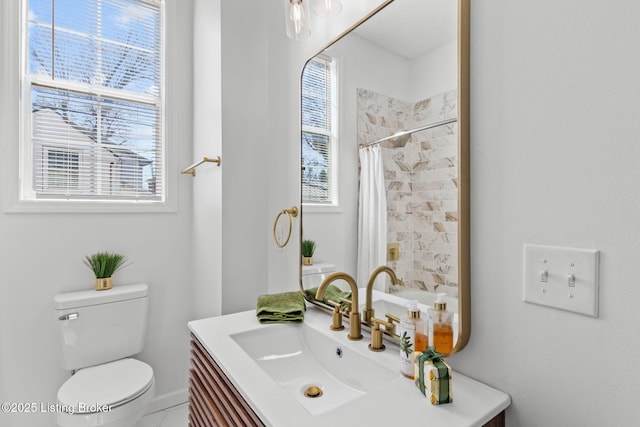 full bath with a shower with shower curtain, toilet, and vanity