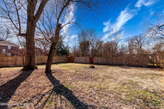 view of yard featuring fence