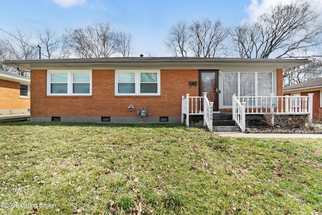 ranch-style home featuring brick siding, crawl space, and a front yard