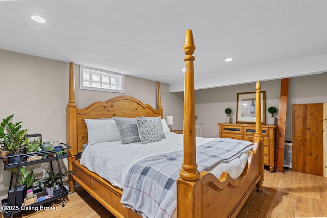 bedroom featuring wood finished floors