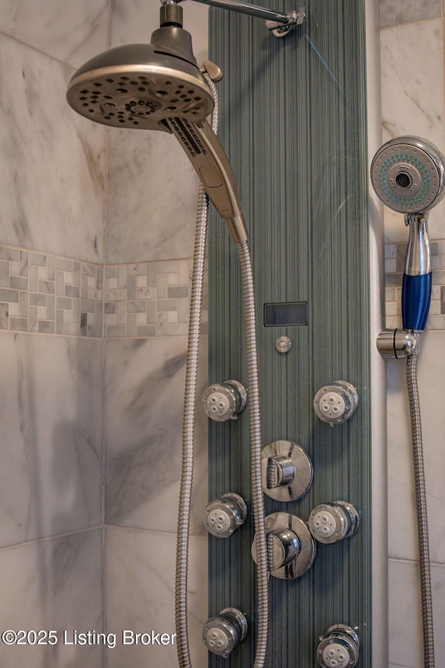 room details featuring a tile shower