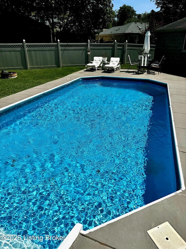 view of pool featuring a fenced in pool and fence