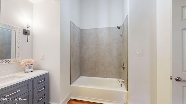 bathroom with vanity and bathing tub / shower combination