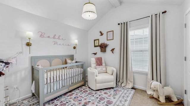 bedroom with carpet flooring, vaulted ceiling with beams, a crib, and baseboards