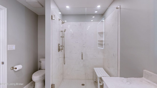 full bathroom with toilet, recessed lighting, and a marble finish shower